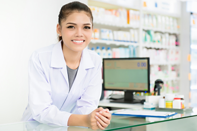 smiling female pharmacist at the pharmacy