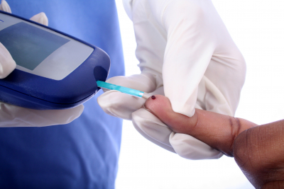 checking diabetic's blood sugar